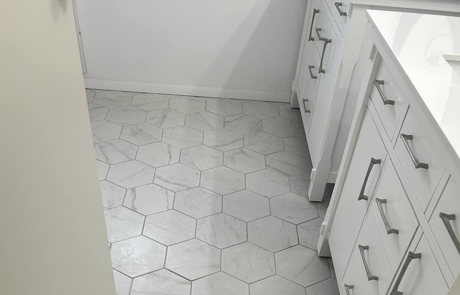 a close up of a tiled wall