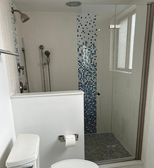 a room with a sink and a mirror