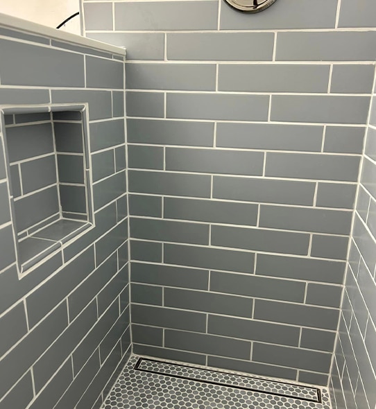 a close up of a tiled wall