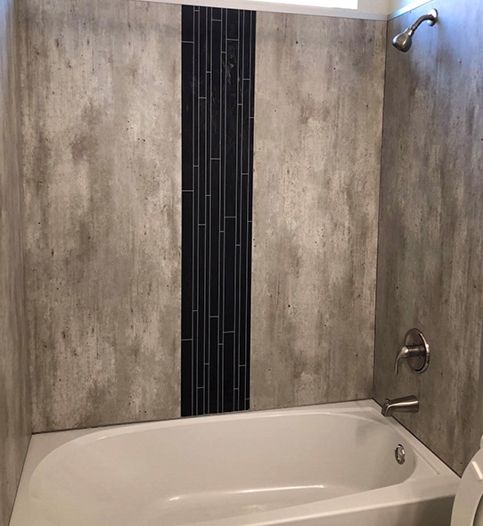 a large tub next to a sink